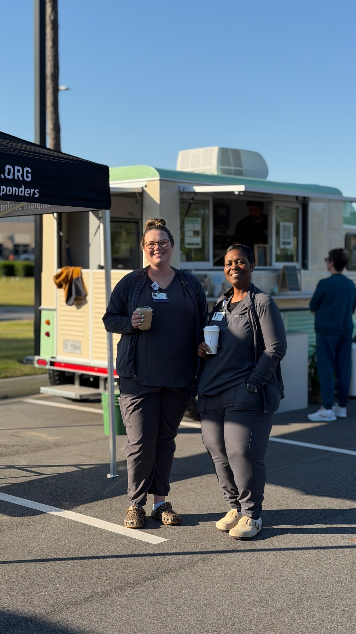 Guests enjoying Common Tides craft coffee at a Wilmington NC community event